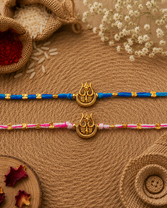 Blue-Pink Trishoola Rakhi Set Pack of 2 | Tilak Set Included