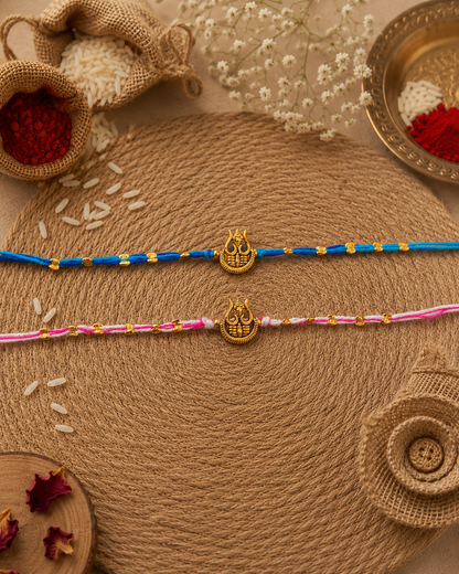 Blue-Pink Trishoola Rakhi Set Pack of 2 | Tilak Set Included
