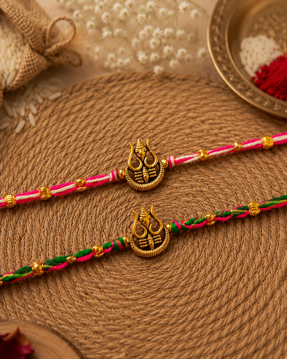 Green-Pink Trishoola Rakhi Set Pack of 2 | Tilak Set Included