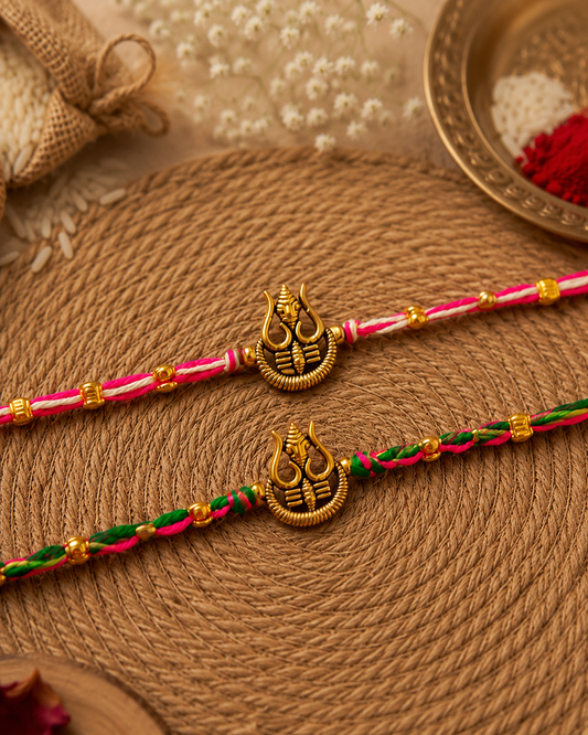 Green-Pink Trishoola Rakhi Set Pack of 2 | Tilak Set Included