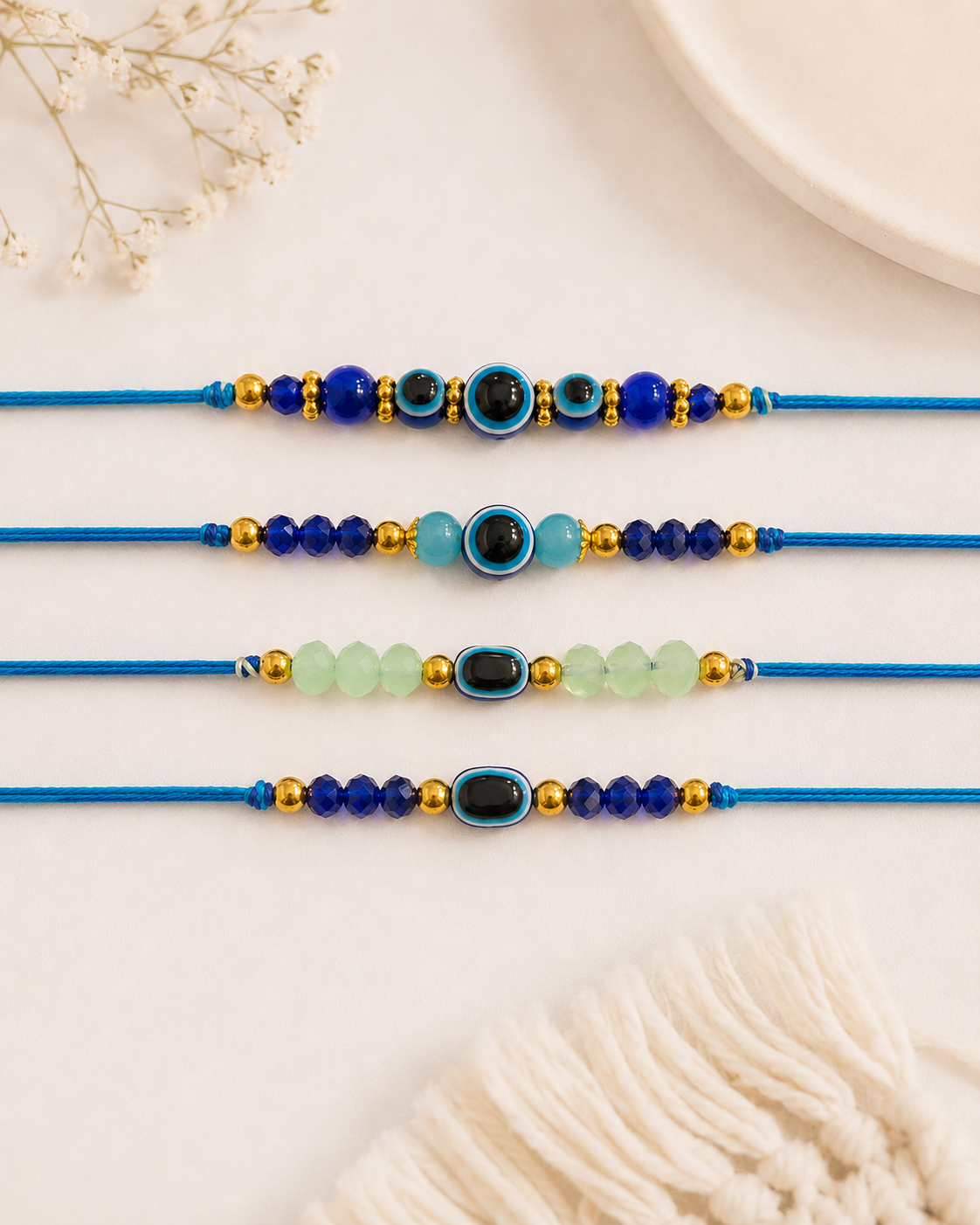 Rythm Evil Eye Rakhi Pack of 4 | Tilak Set Included