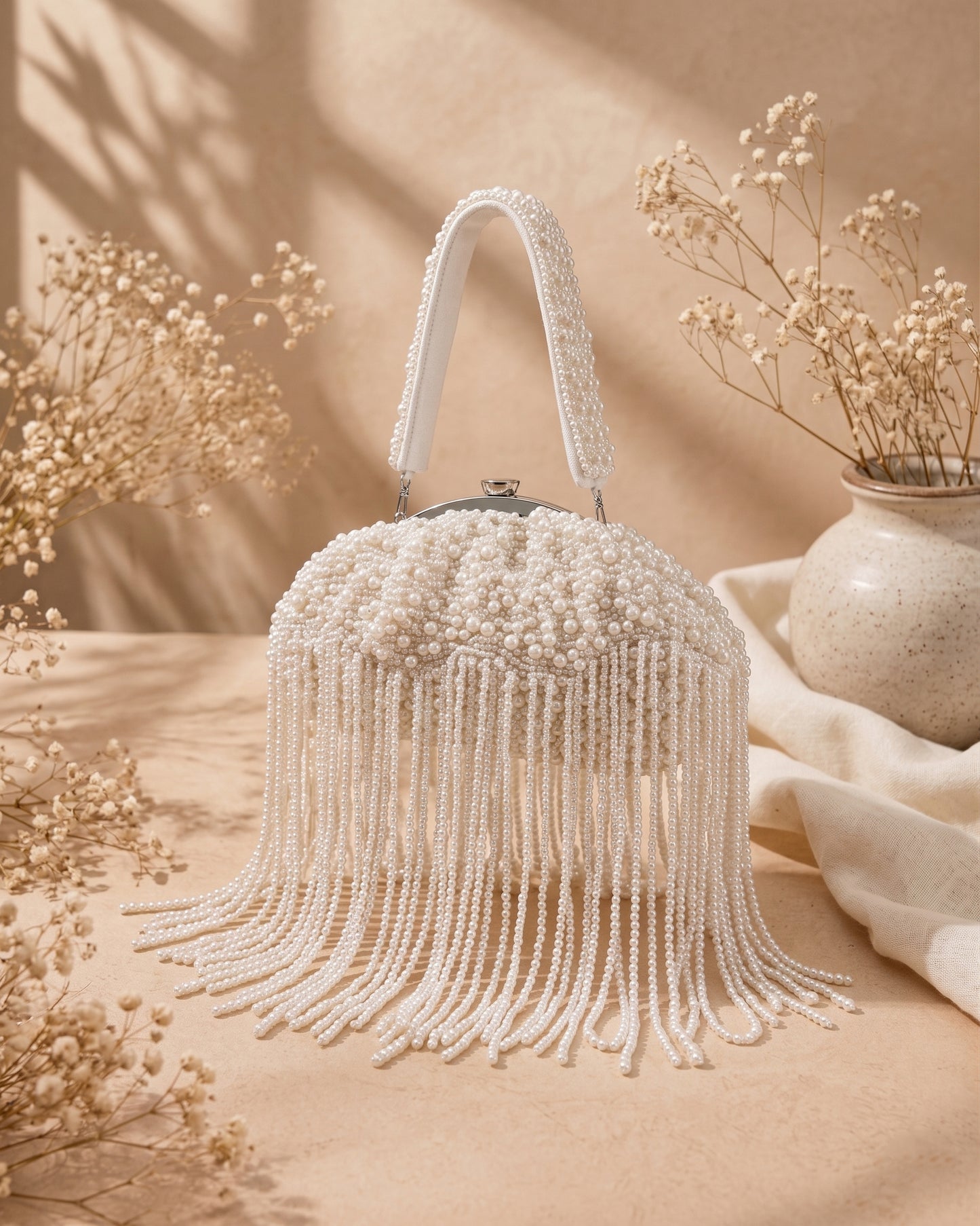 Cartina Premium Pearl Detailed Potli Style Clutch