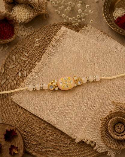 Peach Jadau Beaded Kundan Rakhi for Brother | Tilak Set Included