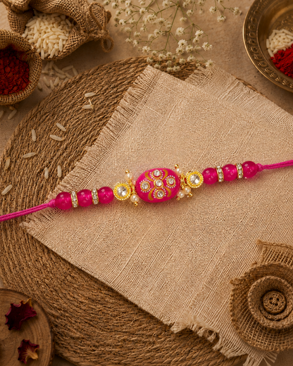 Pink Jadau Beaded Kundan Rakhi for Brother | Tilak Set Included