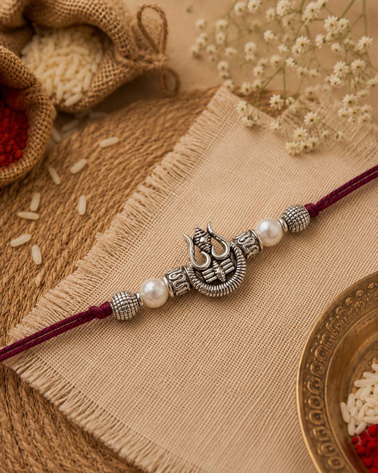 Silver Trishul Rakhi for Brother | Tilak Set Included