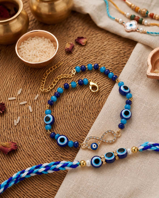 Kanak - Atharv Evil Eye     Bhaiya Bhabhi Rakhi Bracelet Set | Tilak Set Included