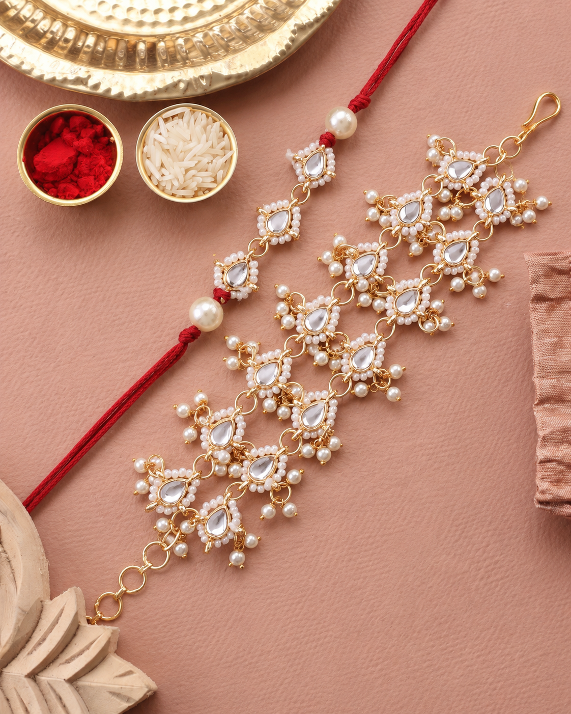 Red Vasundhara Bhaiya Rakhi and Bhabhi Bracelet with Tilak Set and Card