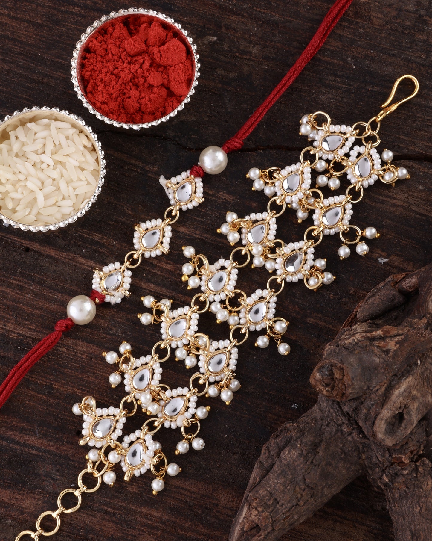 Red Vasundhara Bhaiya Rakhi and Bhabhi Bracelet with Tilak Set and Card
