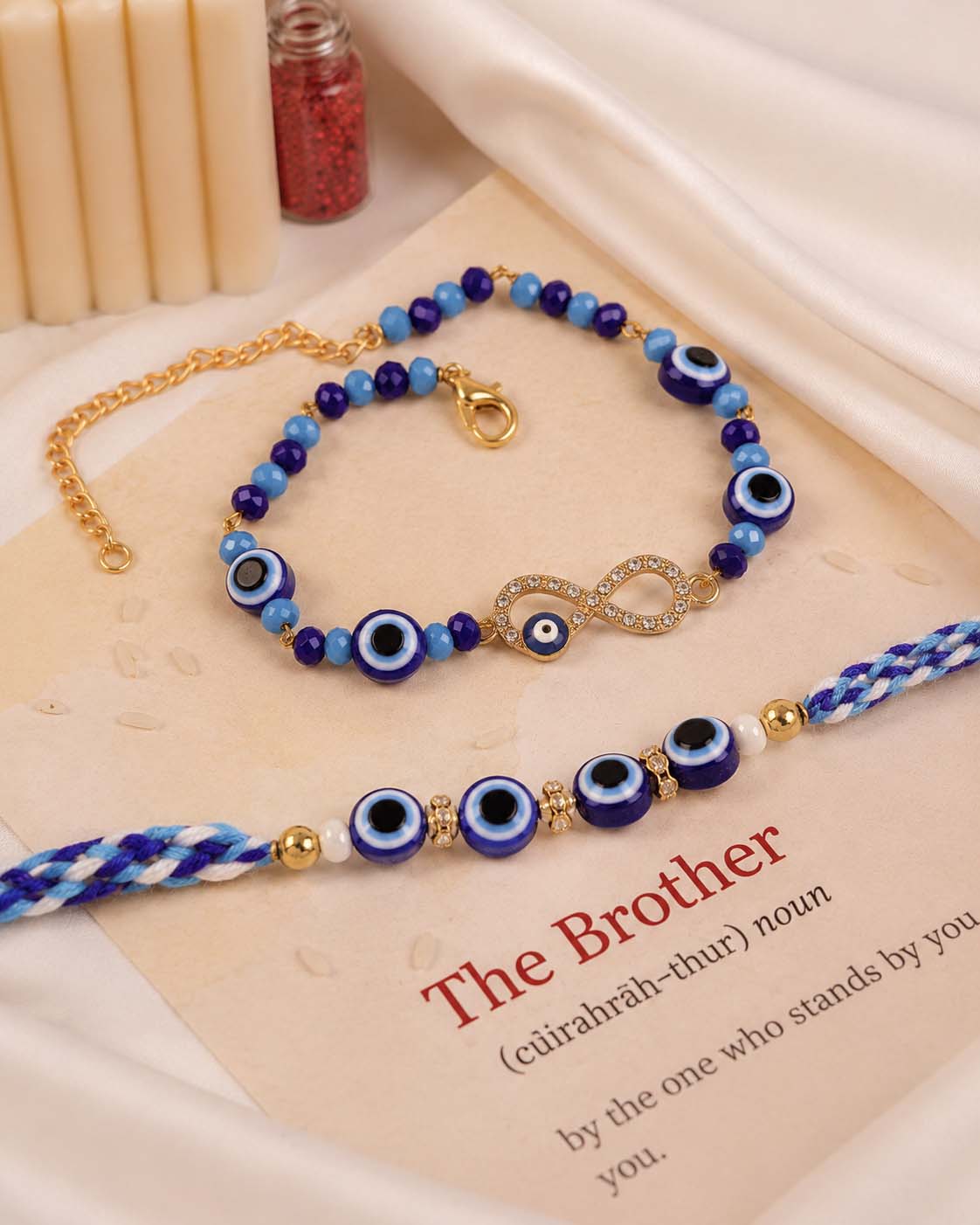 Kanak - Atharv Evil Eye     Bhaiya Bhabhi Rakhi Bracelet Set | Tilak Set Included