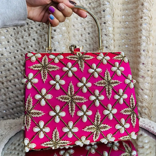 Pink Amayra Suitcase Clutch