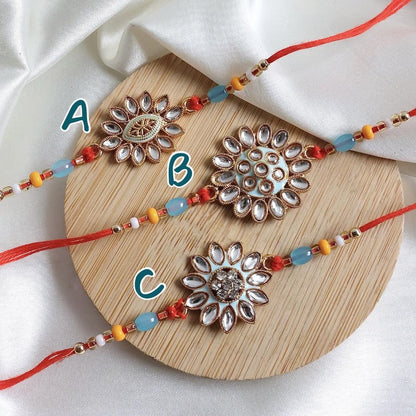 Enthralling Stone Rakhi Set with Tilak Combo