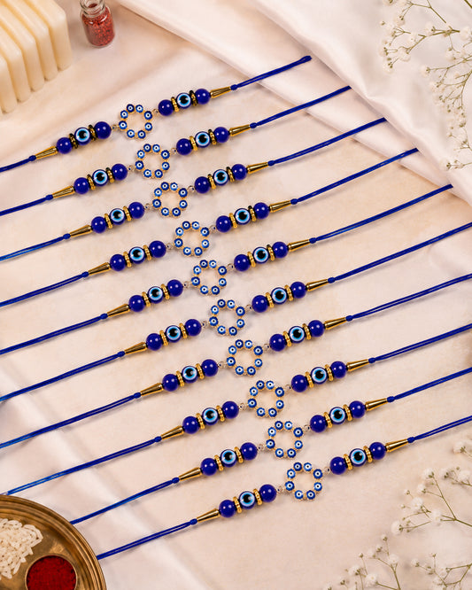 Pack of 10 Blue Chakra Evil Eye Rakhi with Card | Tilak Set Included
