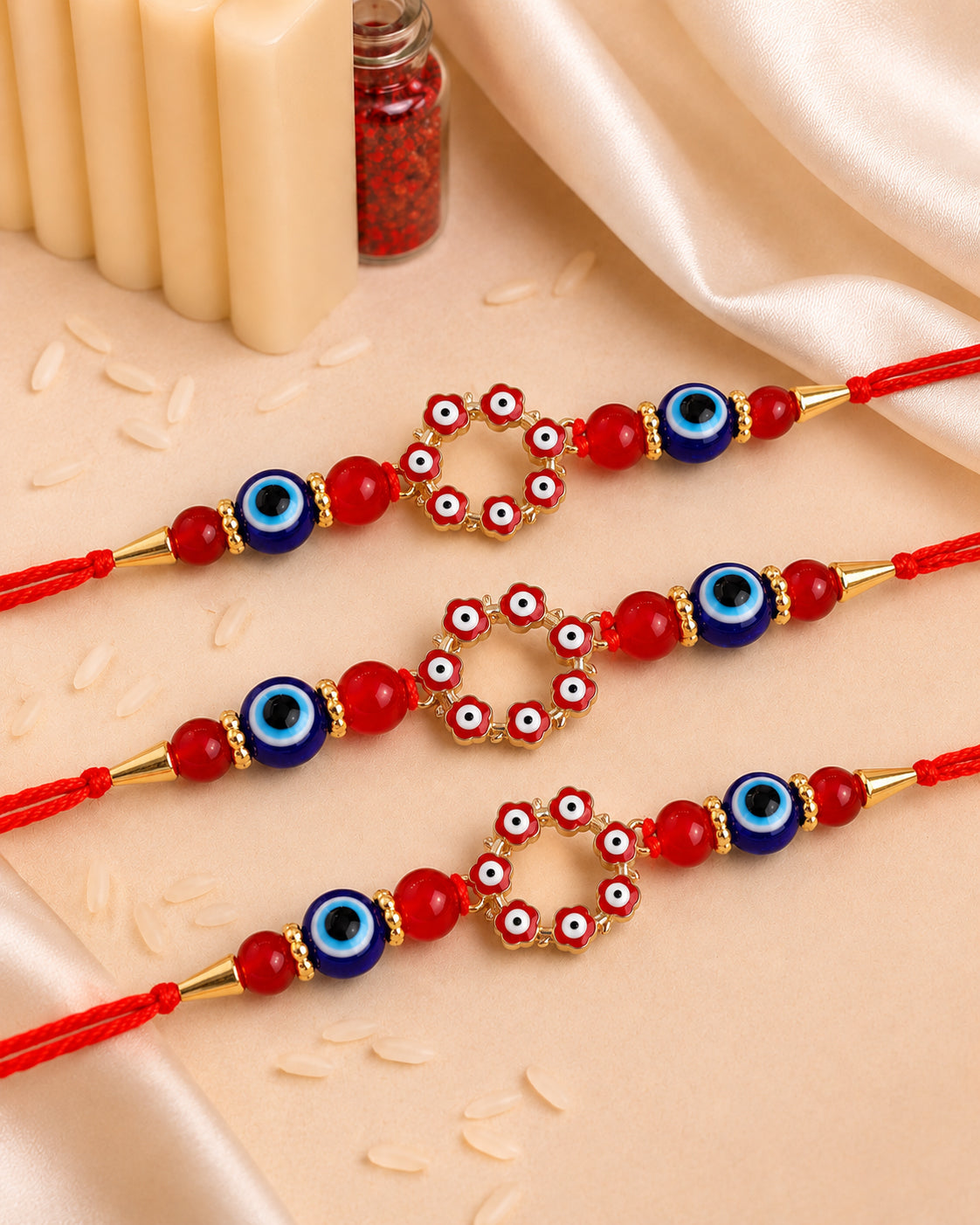 Pack of 3 Red Chakra Evil Eye Rakhi with Card | Tilak Set Included