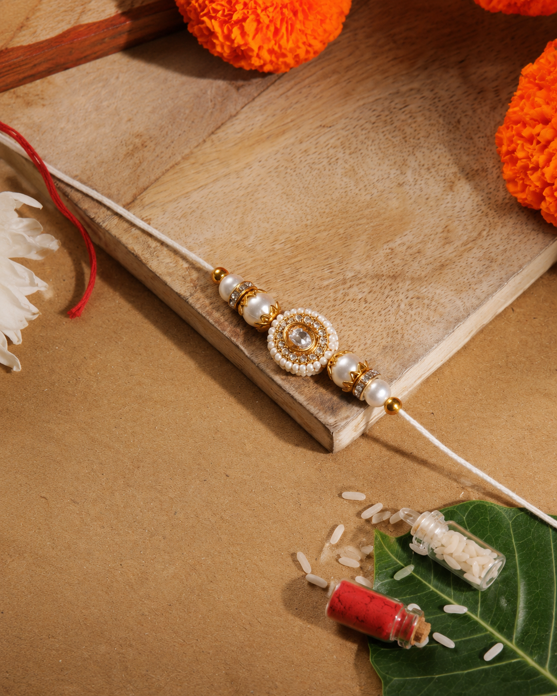 Pearl Maerika Zircone Rakhi for Brother | Tilak Set Included