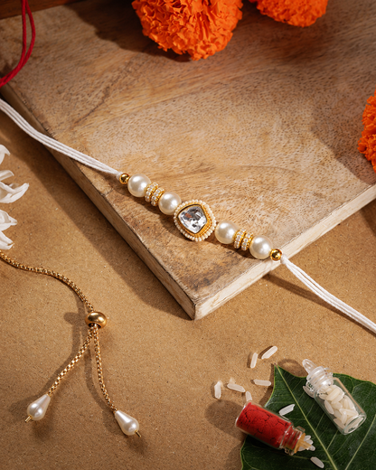 Silver Elanika Kundan Rakhi for Brother | Tilak Set Included