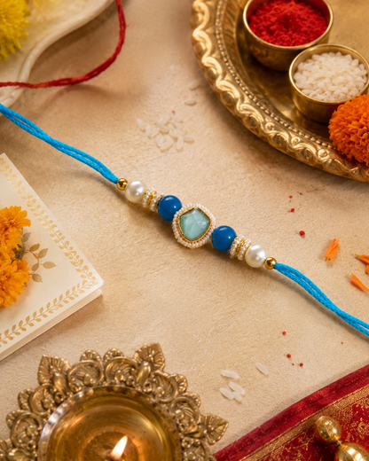 Turquoise Elanika Kundan Rakhi for Brother | Tilak Set Included