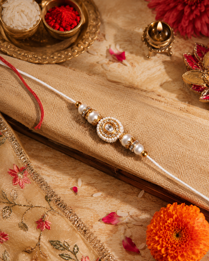 Pearl Maerika Zircone Rakhi for Brother | Tilak Set Included