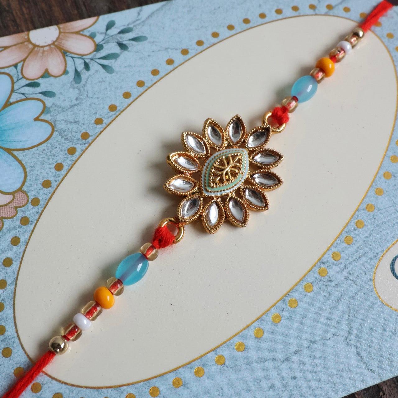 Enthralling Stone Rakhi Set with Tilak Combo