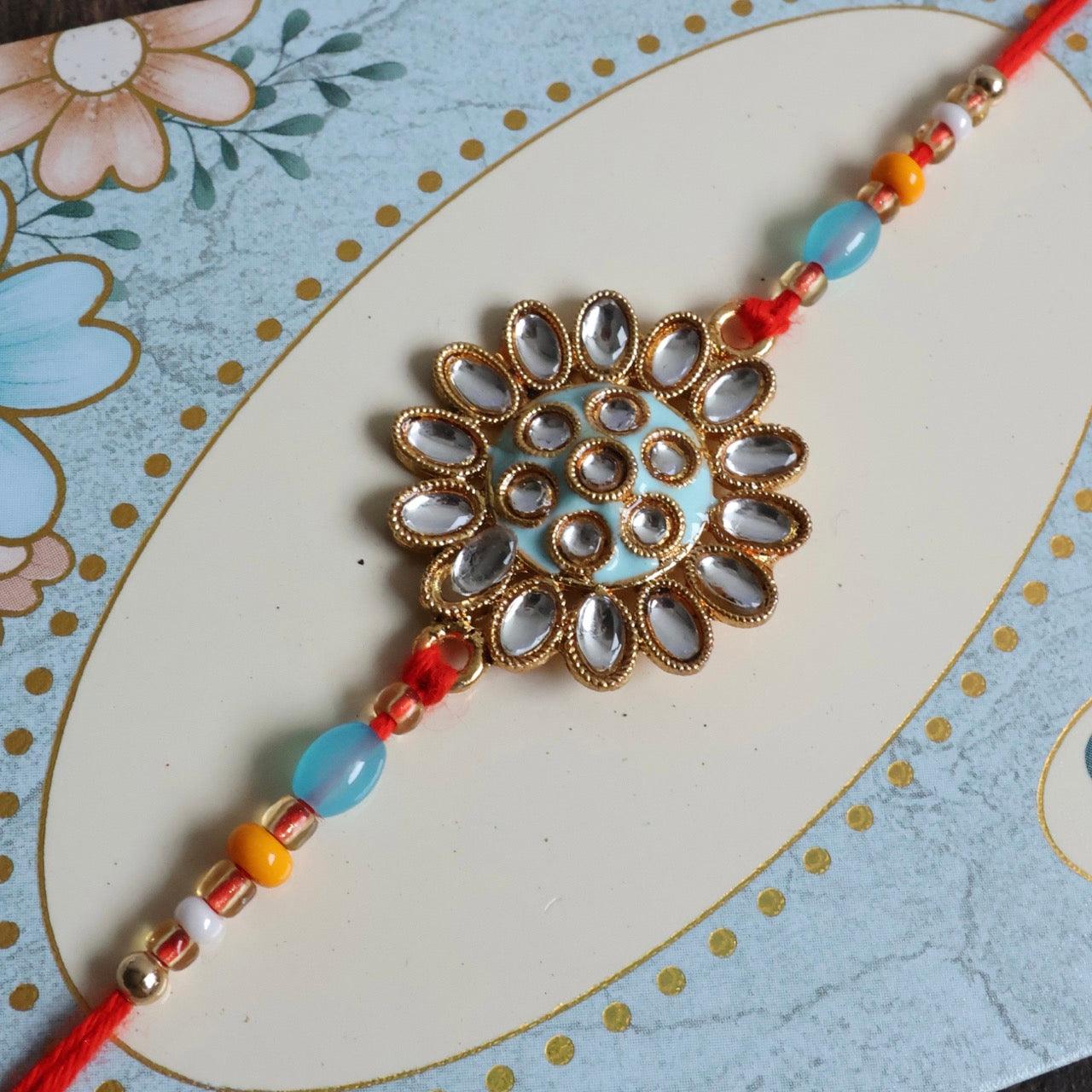 Enthralling Stone Rakhi Set with Tilak Combo