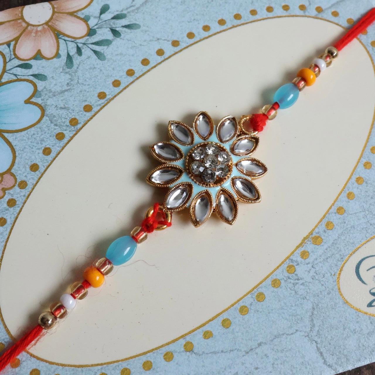 Enthralling Stone Rakhi Set with Tilak Combo