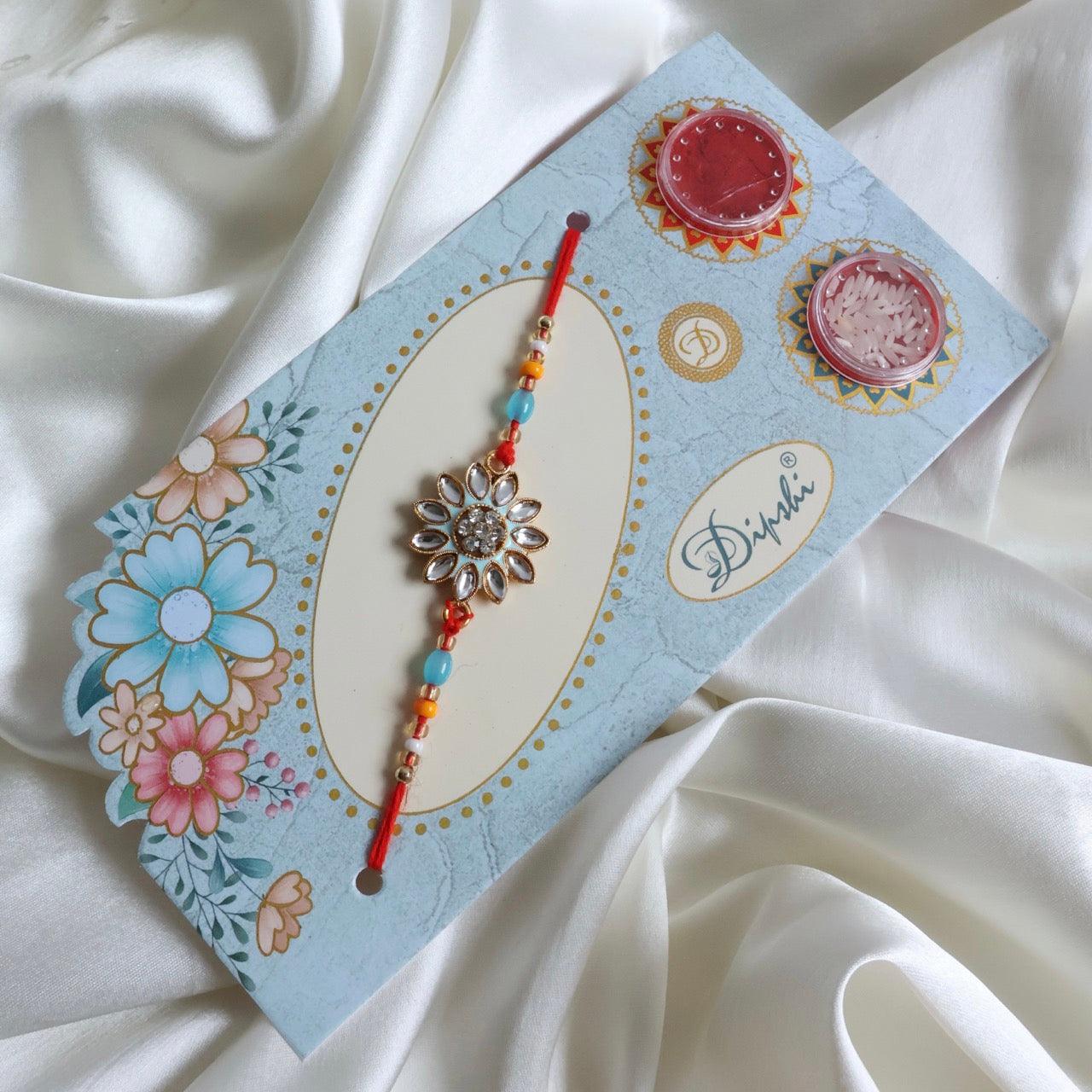Enthralling Stone Rakhi Set with Tilak Combo