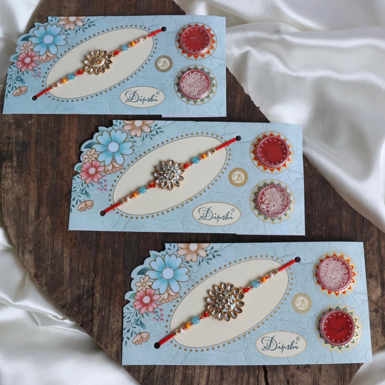 Enthralling Stone Rakhi Set with Tilak Combo