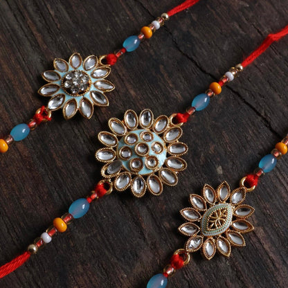 Enthralling Stone Rakhi Set with Tilak Combo