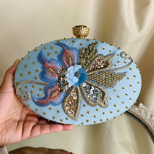Turquoise Oval Sanvi Embroidered Clutch