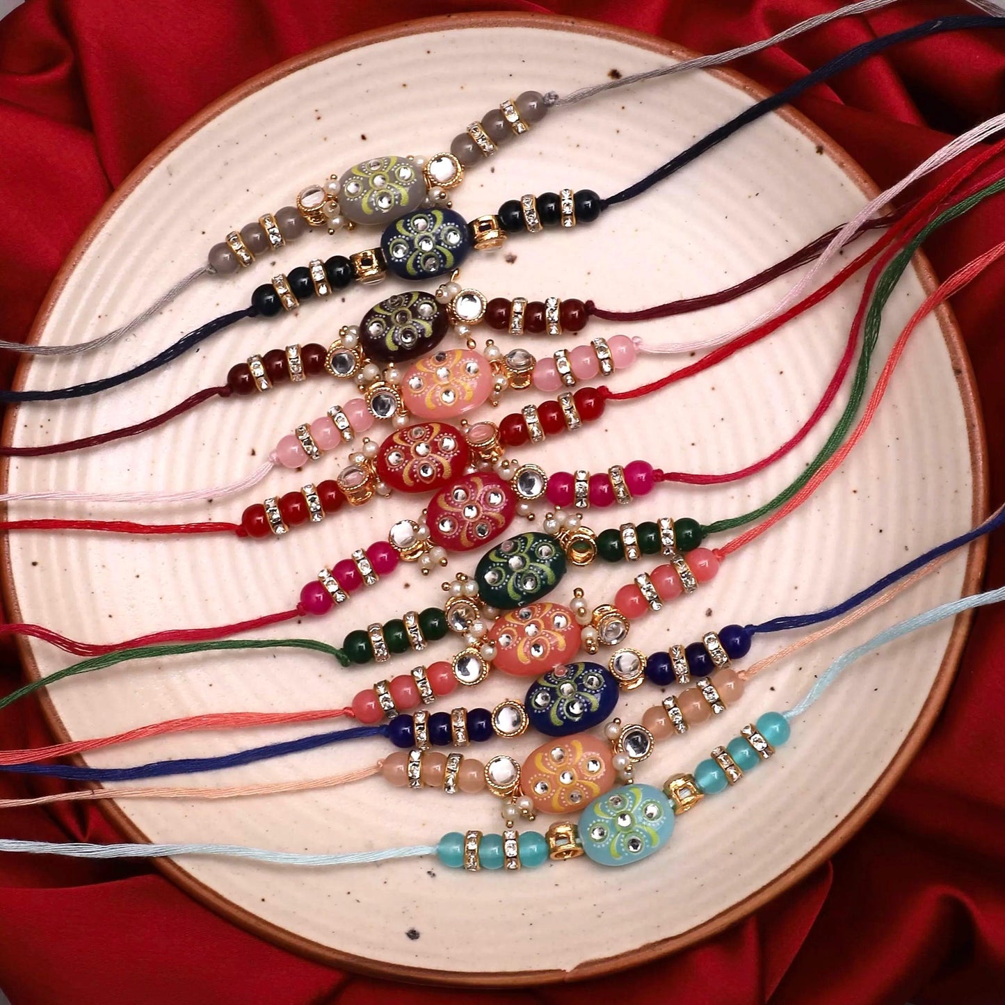 Pack Of 2 Jadau Beaded Kundan Rakhi with Tilak Set and Card