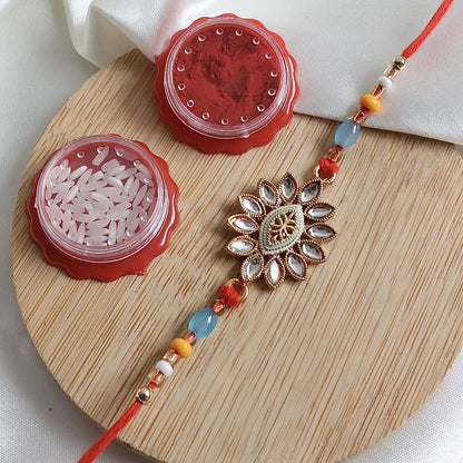 Enthralling Stone Rakhi Set with Tilak Combo