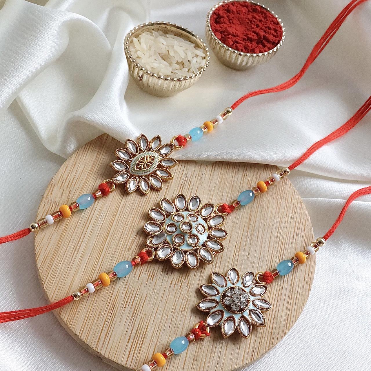 Enthralling Stone Rakhi Set with Tilak Combo