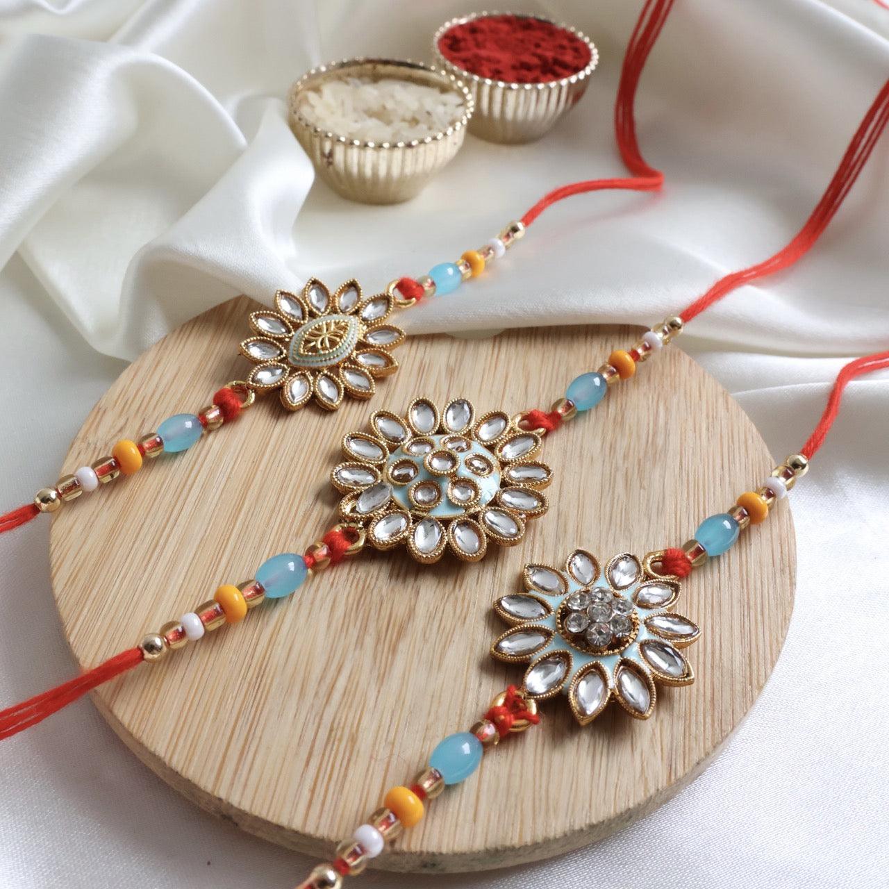 Enthralling Stone Rakhi Set with Tilak Combo