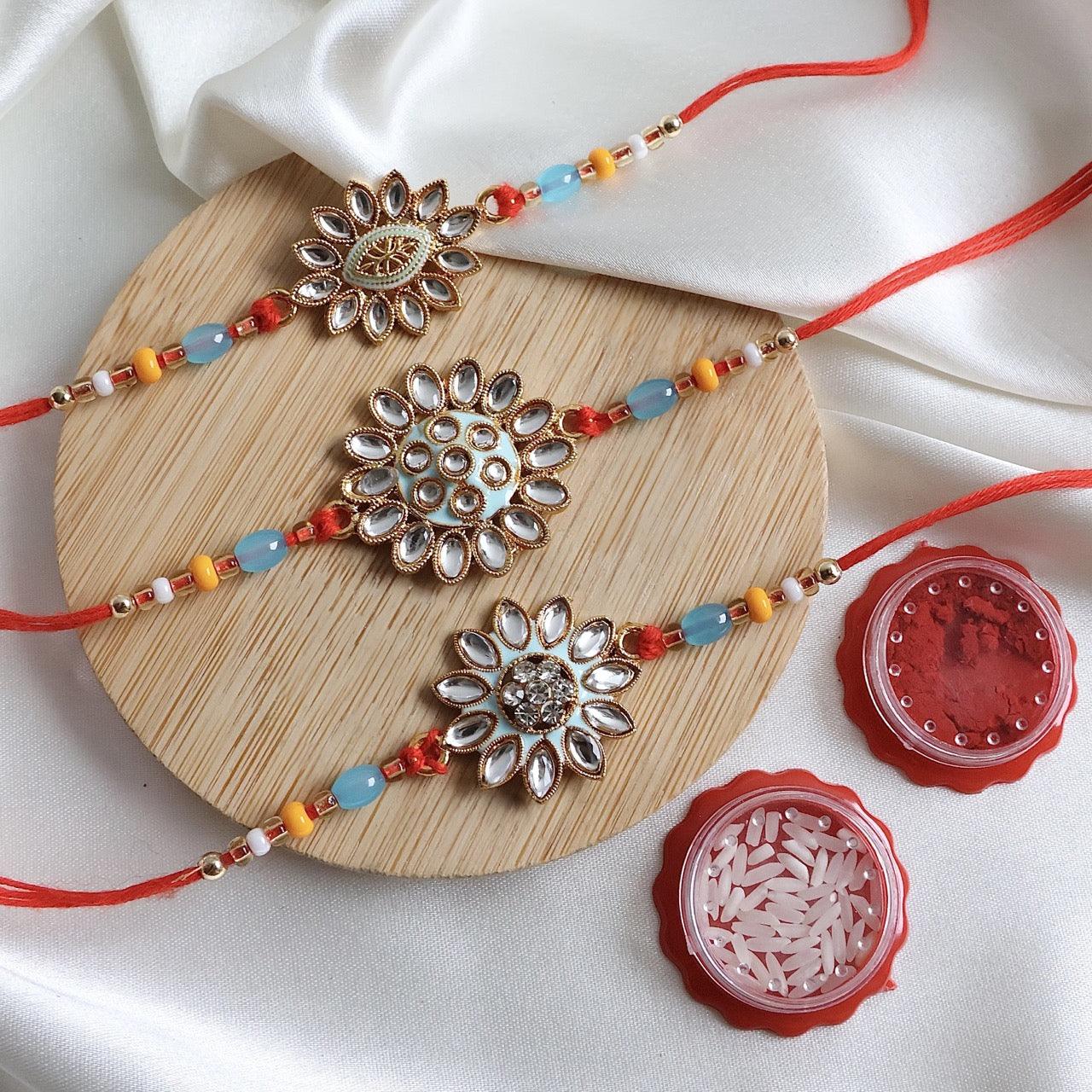 Enthralling Stone Rakhi Set with Tilak Combo