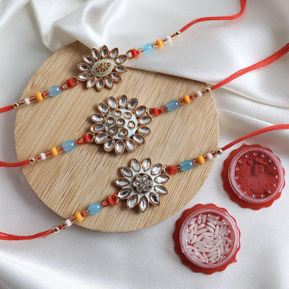 Enthralling Stone Rakhi Set with Tilak Combo
