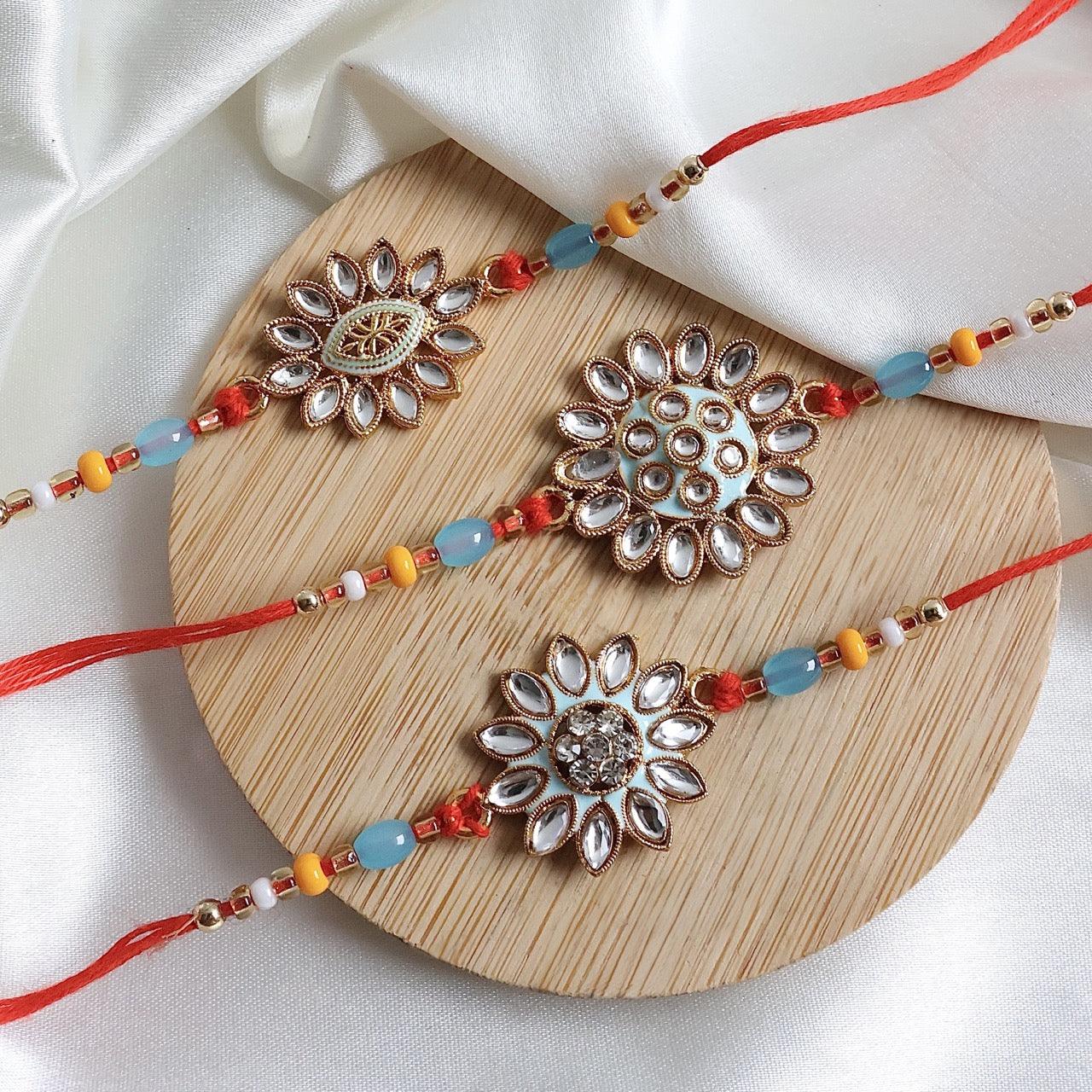 Enthralling Stone Rakhi Set with Tilak Combo