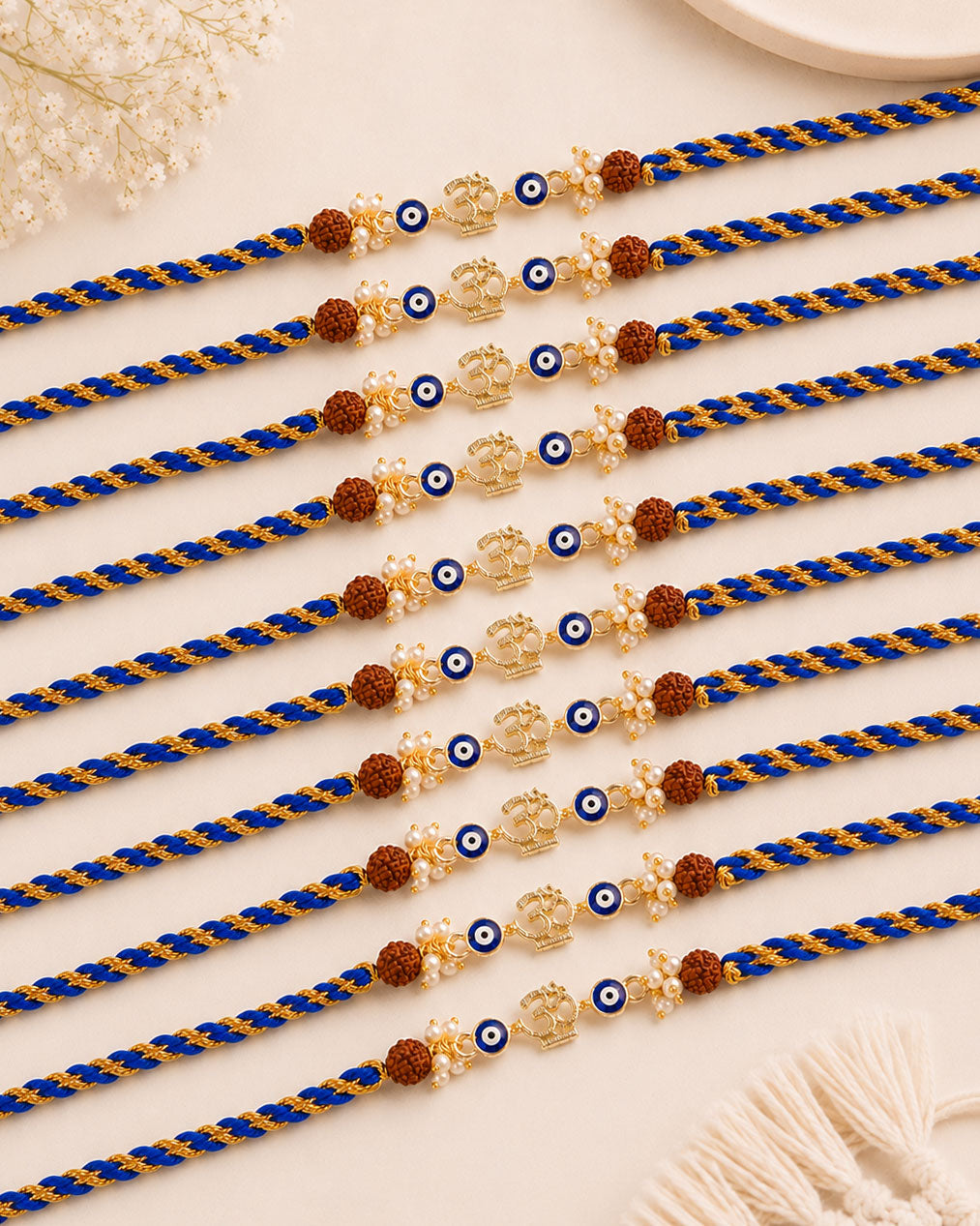 Pack of 10 OM Evil Eye Rakhi with Card | Tilak Set Included